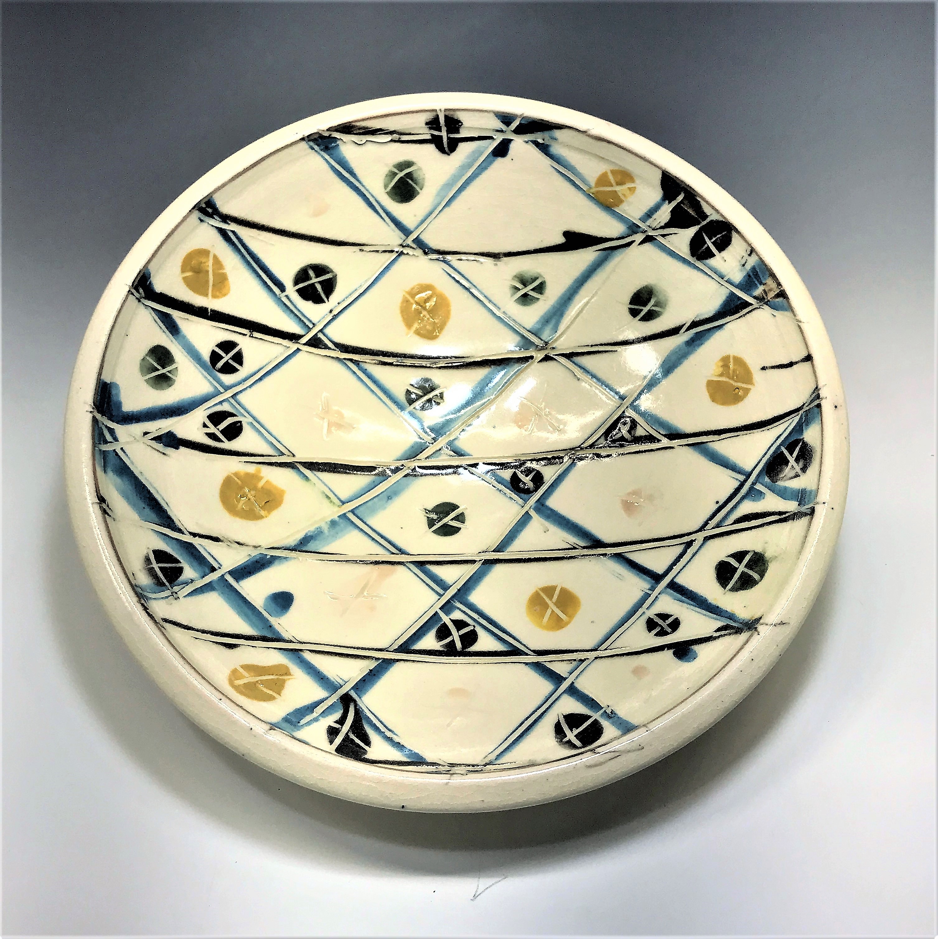 Stephen D. Frazier’s serving bowl 9 in. (23 cm) in diameter, white earthenware, underglaze, fired cone 1.