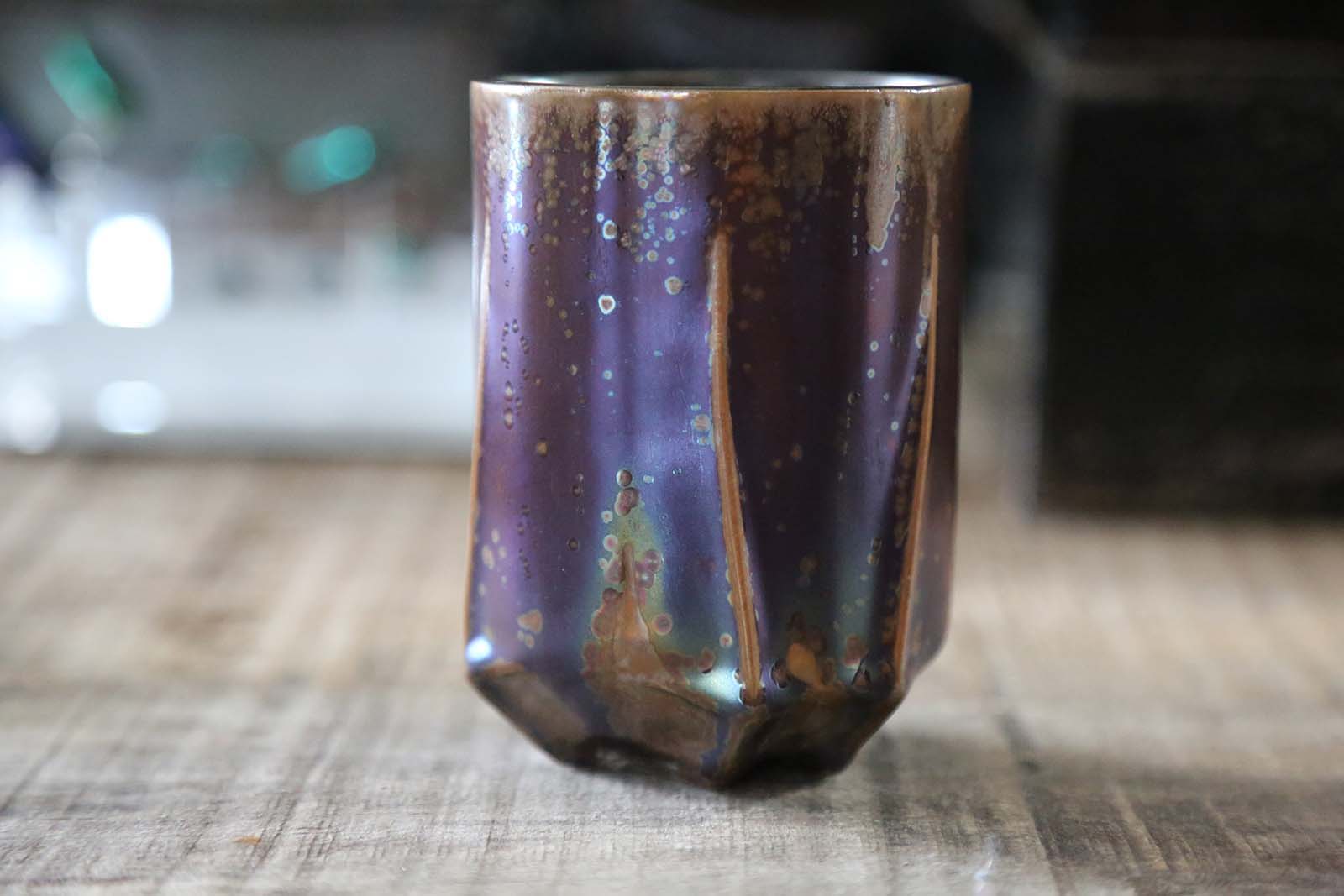 Sutherlin Santo, Jewel tumbler (purple), 4.25 in. (11 cm) in height, porcelain, iridescent purple glaze, fired to cone 6, 2021.