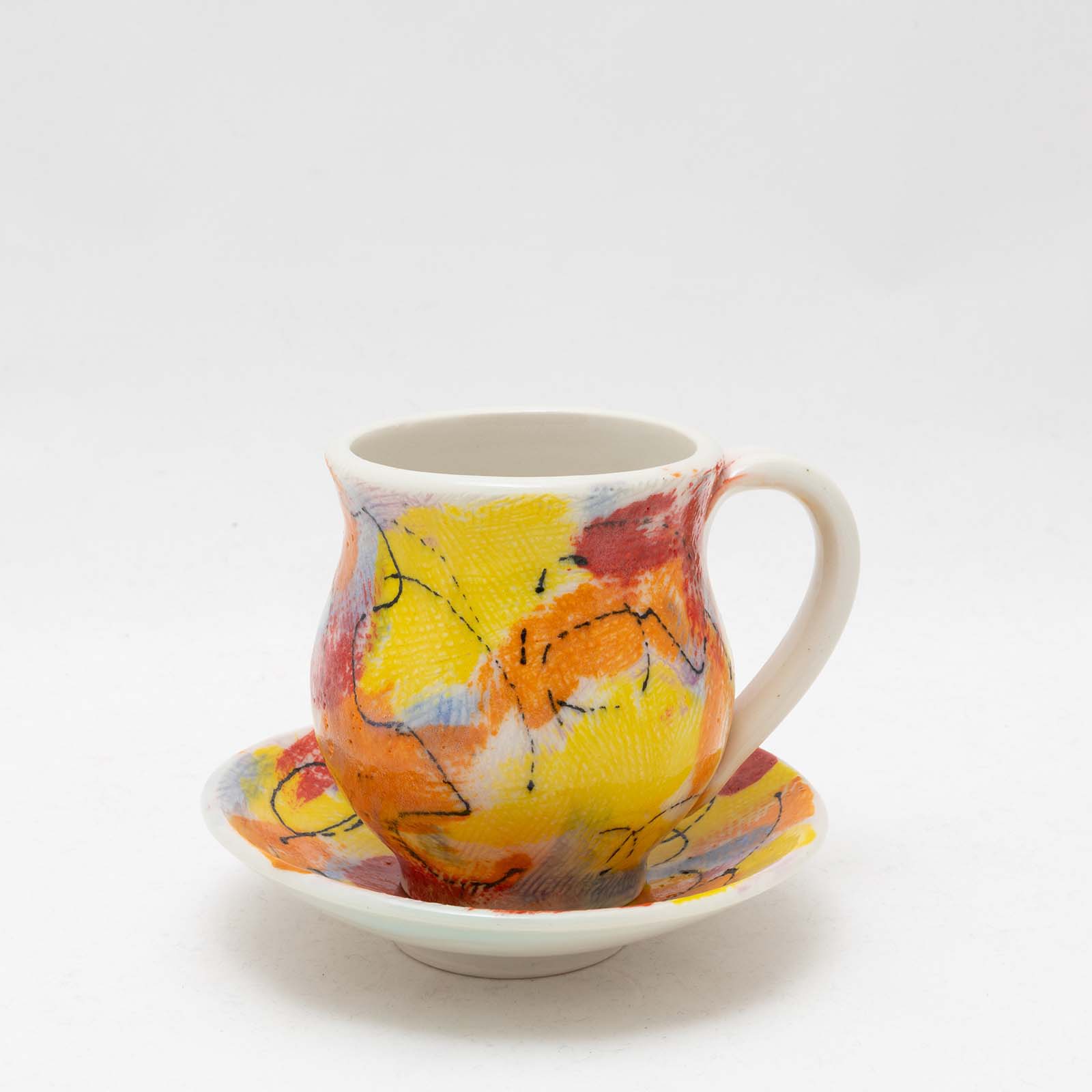 Janet K. Burner, Color Me Color, cup: 4 in. (10 cm) in height; saucer 5.5 in. (14) in diameter, fired to cone 10 in oxidation, 2021. 