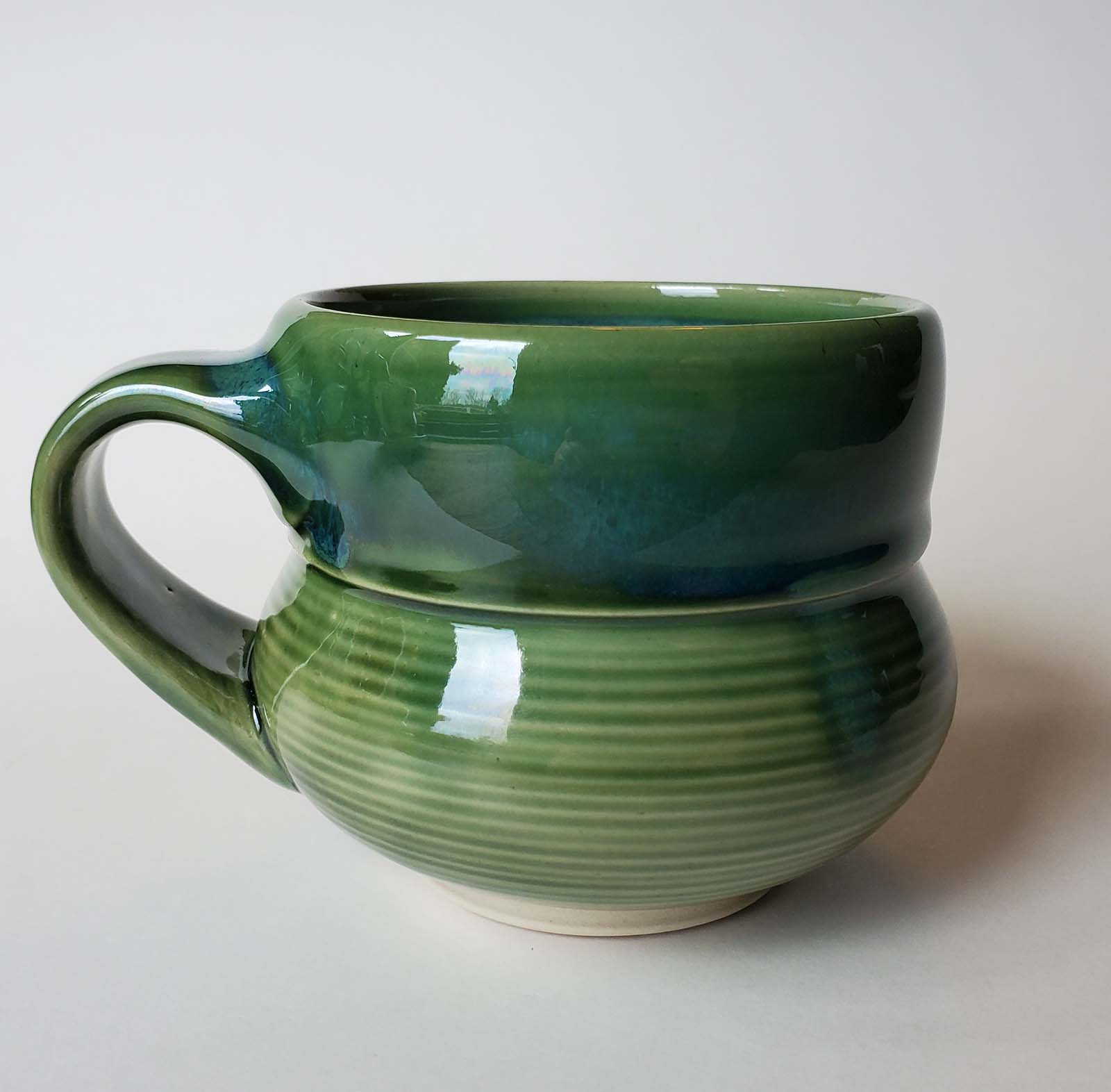 Laura McGraw, mug 3, 4 in. (10 cm) in height, porcelain, clay, glaze, fired to cone 6, 2021.