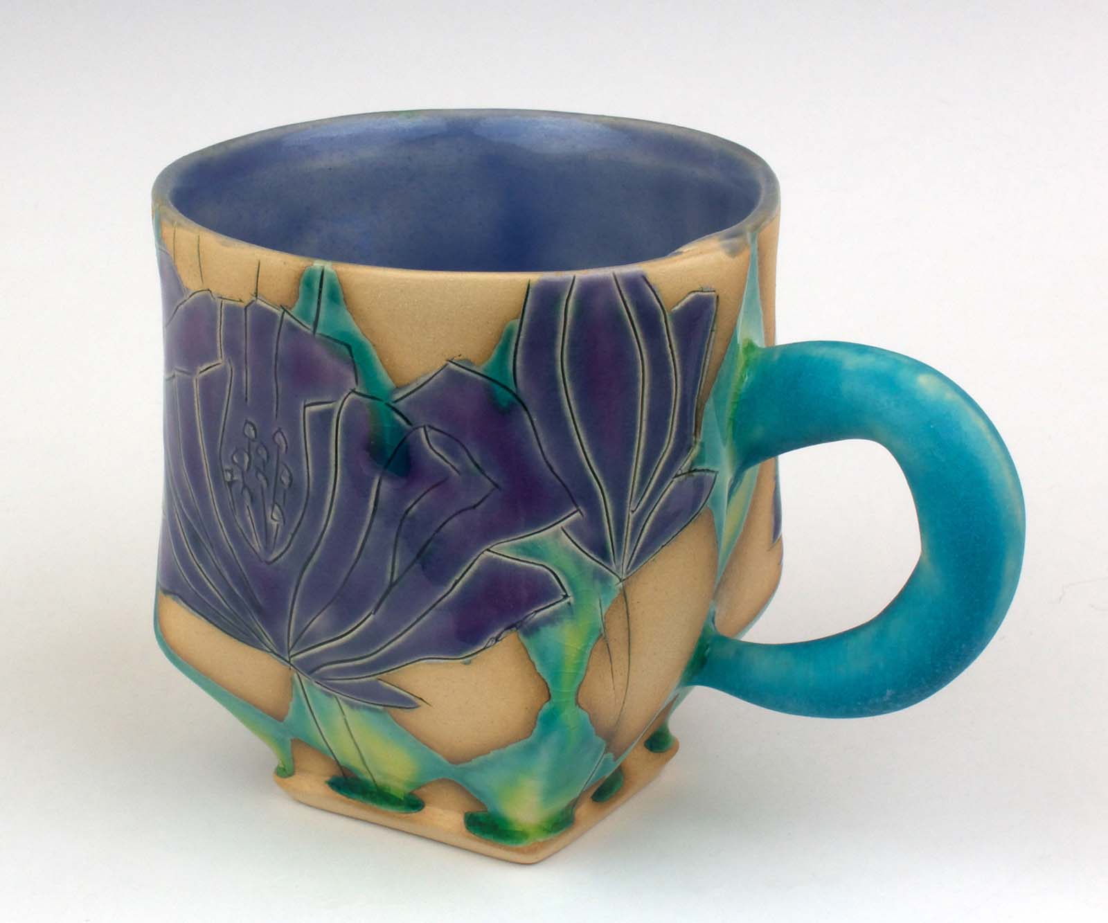 Shana Salaff, mug with purple poppies, 4.5 in. (11 cm) in height, porcelaneous stoneware, fired to cone 5 in oxidation, 2021.