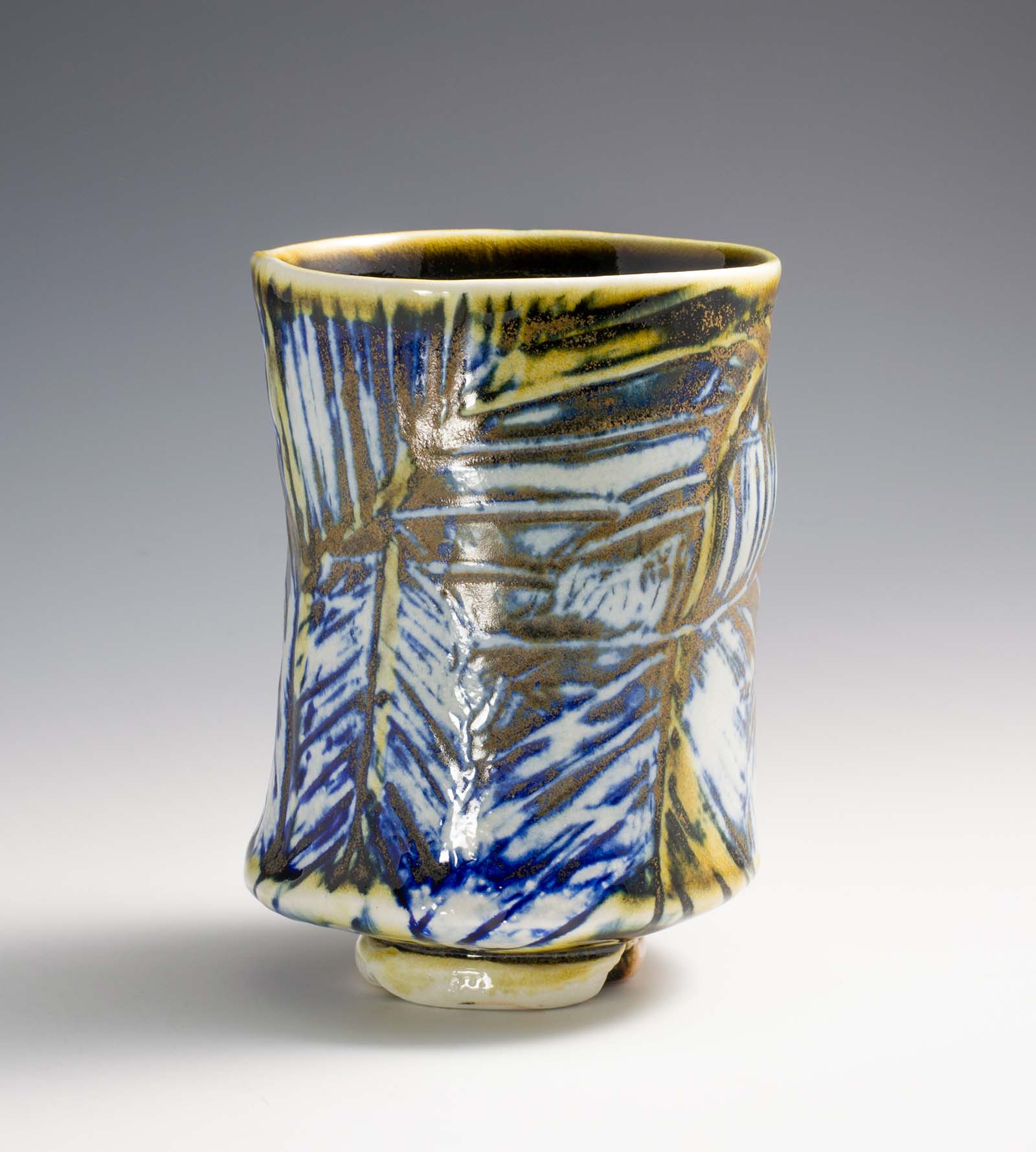 Margaret Seidenberg-Ellis, leaf-textured cup, 4.5 in. (11 cm) in height, porcelain, slip, wood and soda fired, 2021.