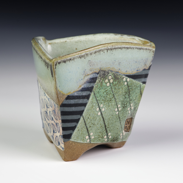 Barry Rhodes: Tricornered Whiskey Cup with Fan Pattern,  3 in. (8 cm) in height, mid-range stoneware with underglazes, slips, underglaze pencil, custom stamps, microcrystalline glaze, fired to cone 6 in oxidation, 2022.