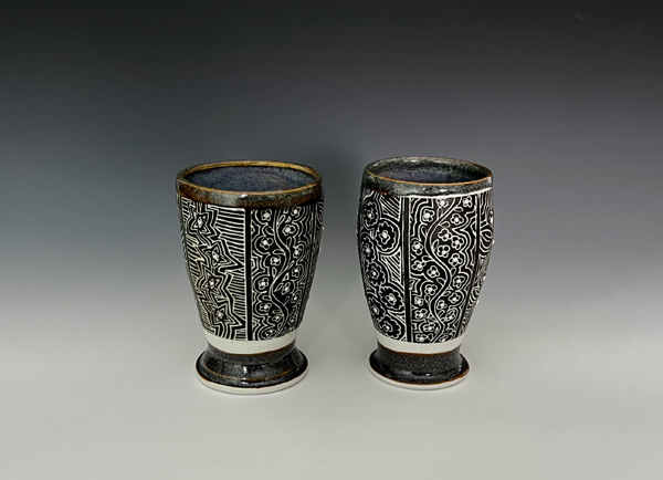 Dee Harris: His’n’Hers, to 5.5 in. (14 cm) in height, Laguna porcelain, black underglaze with sgrafitto decoration, glaze, fired to cone 10/11 in a soda kiln, 2022.
