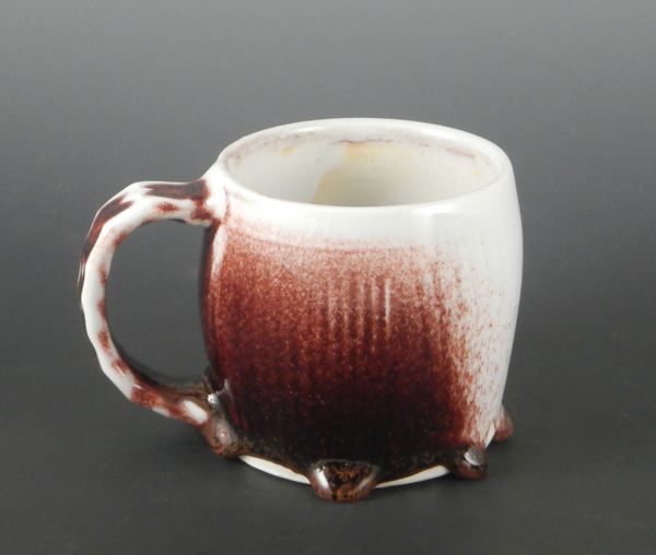 Mimi Stadler: Oxblood Cup 2, 3.5 in. (9 cm) in height, porcelain with copper red glaze, fired in reduction to cone 10, 2022.