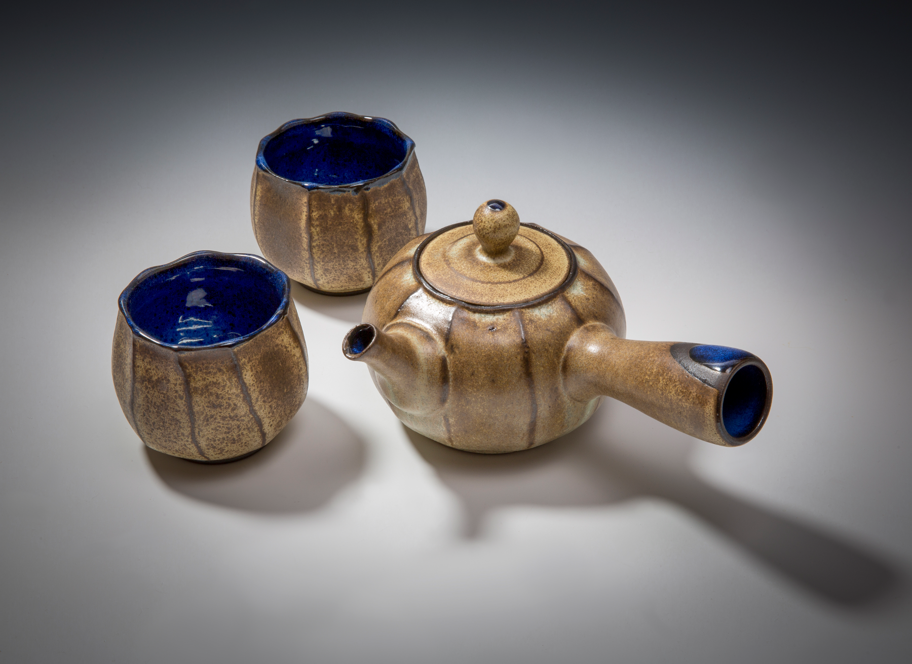 Polina Miller, tea set, teapot: 7 1/2 in. (19 cm) in height; cups 3 1/2 in. (9 cm) in height, wheel-thrown stoneware, fired to cone 6 in oxidation